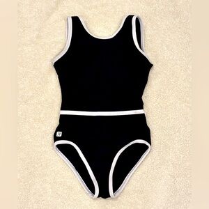 Sylvia P Black and White Leotard with open back, size 10.